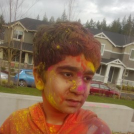 KID PLAYING HOLI